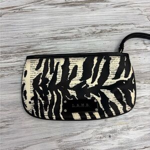L.A.M.B.  Zebra Pattern Newsprint Wristlet